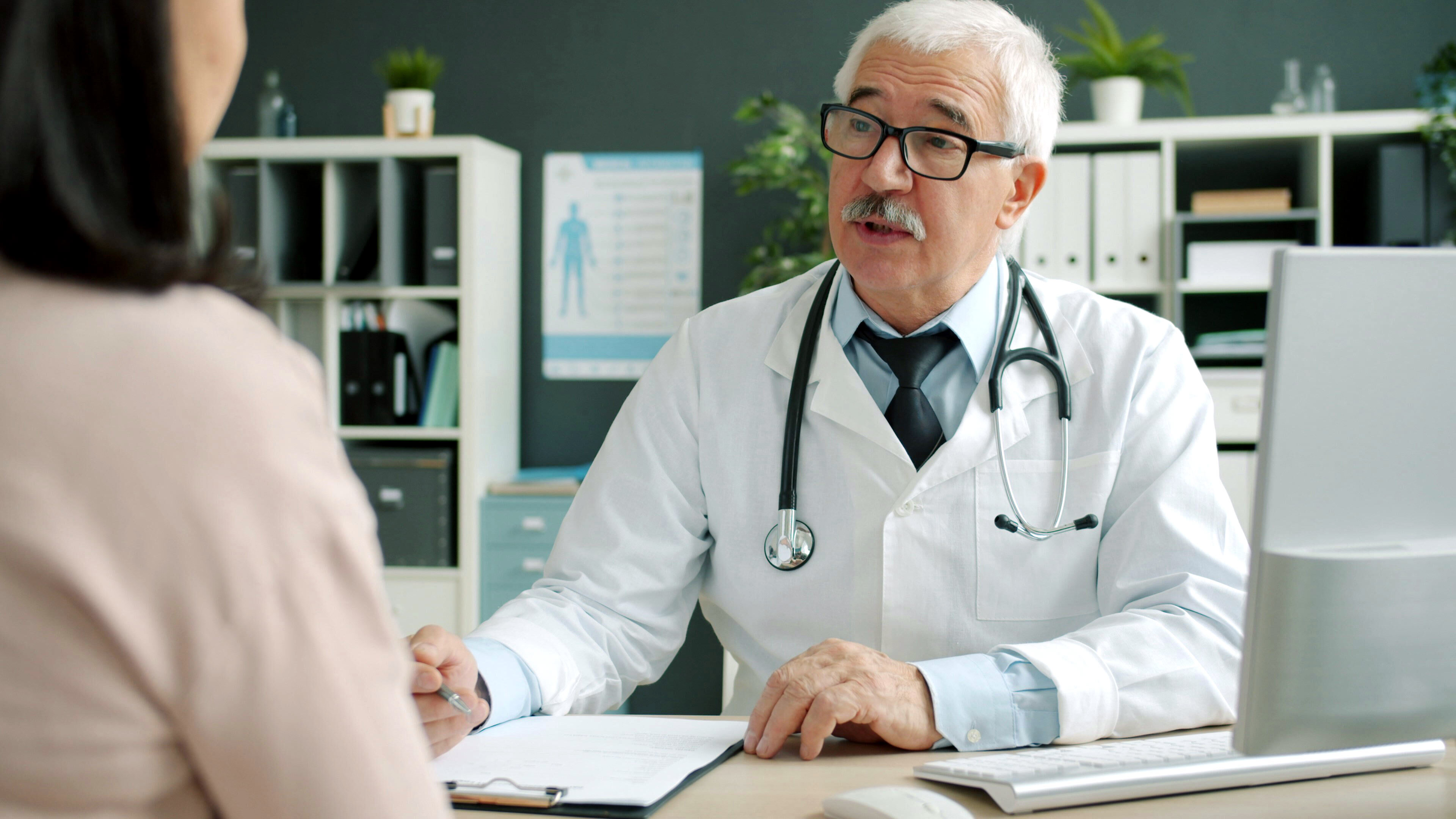 Doctor consulting with a patient in a medical practice